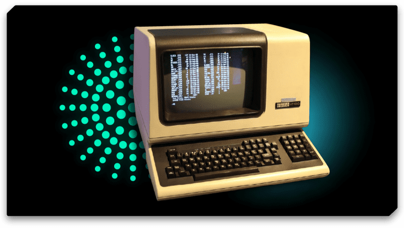 Um computador antigo sem mouse com Unix como sistema operacional.
