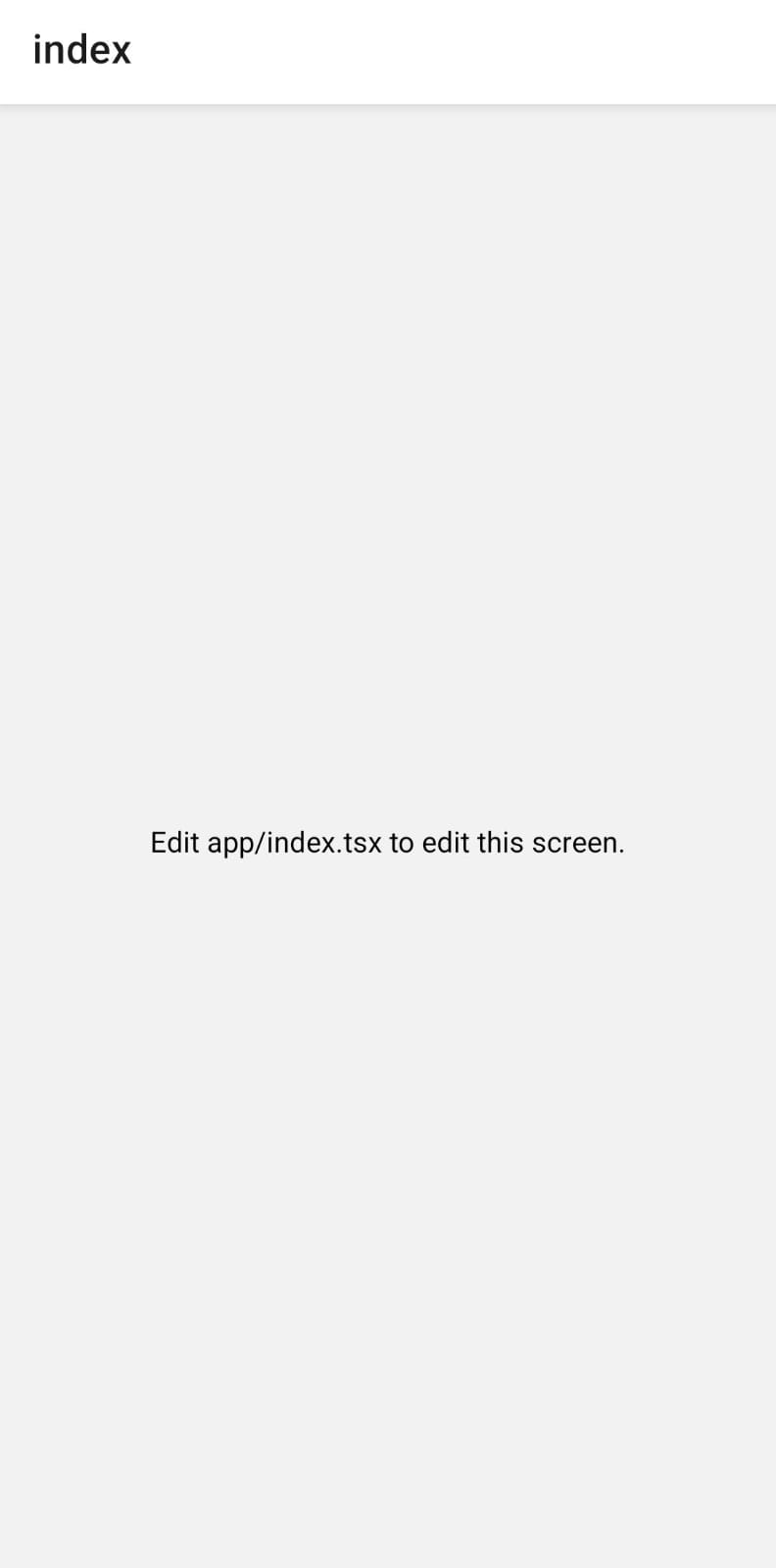 Tela inicial do aplicativo Expo exibindo a mensagem "Edit app/index.tsx to edit this screen.", indicando que a interface padrão do projeto pode ser editada no arquivo mencionado.