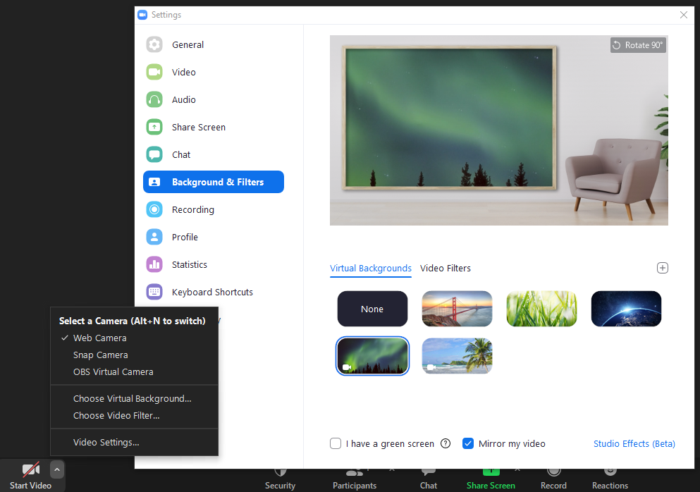 Tela Zoom com seleção de menu "Start Video ^ > Choose virtual background... > Background & Filters". Na aba de “Virtual Backgrounds” é possível visualizar 5 opções de fundo e uma opção de “None” para que nenhum fundo seja aplicado. À direita da aba “Virtual Backgrounds” está a aba para seleção de filtros, “Video Filters”.