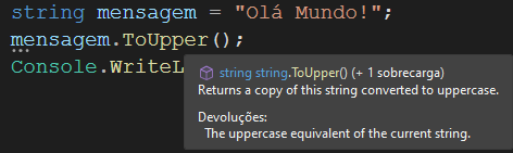 Parte do código no Visual Studio Community, com uma janela suspensa com informações do tipo de retorno do método .ToUpper().